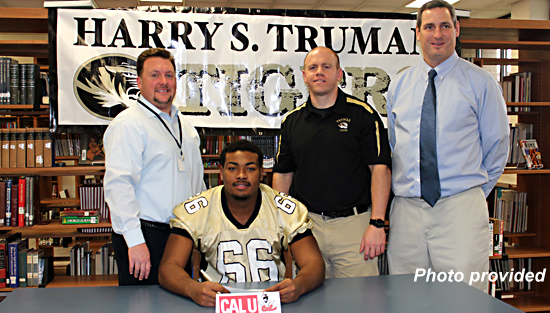 02.10.13.signing.truman